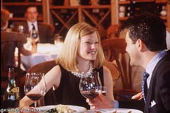 A couple dining in a restaurant; Size=240 pixels wide